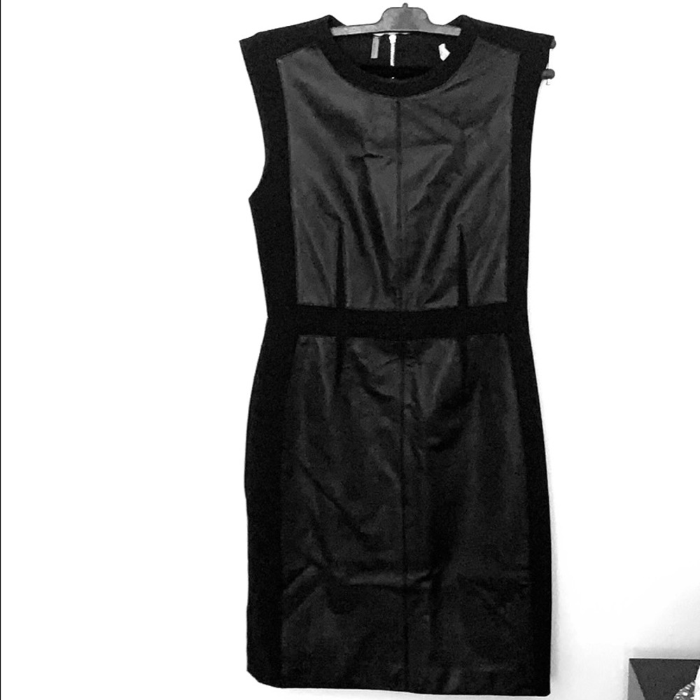 Black with lamb leather lining, size 6 dress